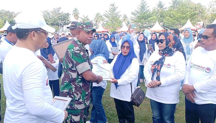 Danramil 1315-04/Tibawa Mewakili Dandim Hadiri Apel Akbar Perangkat Desa Kabupaten Gorontalo