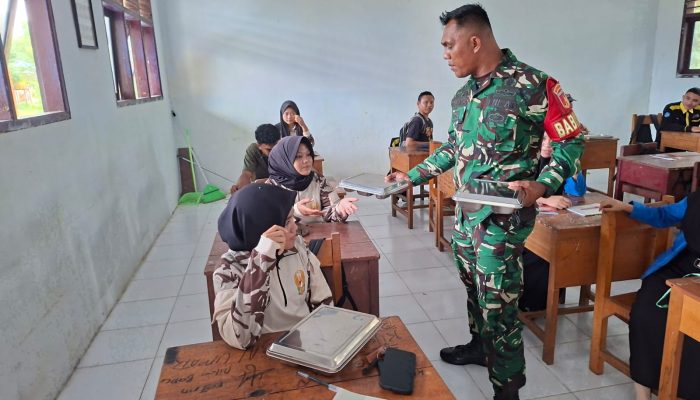 Babinsa Kwandang Dampingi Penyaluran Makan Bergizi Gratis di SMKN 1 Gorut